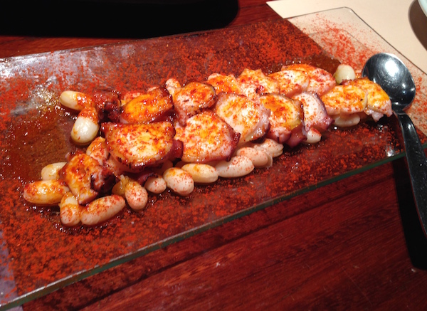 Pulpo, unas pocas judias blancas, pimentón i aceite de oliva virgen (Octopus, haricot beans, pimentón and virgin olive oil) as served at Goliard. 