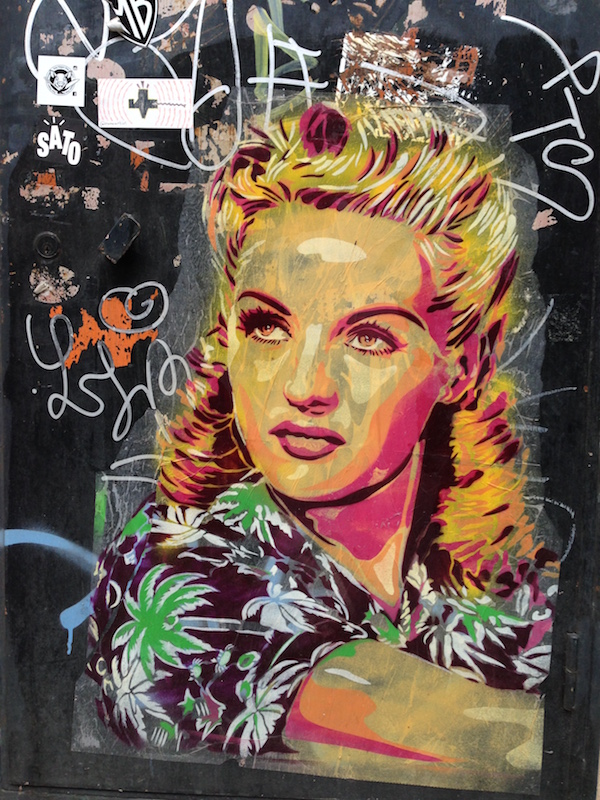 Graffiti stencil portrait of Rita Hayworth in Barcelona